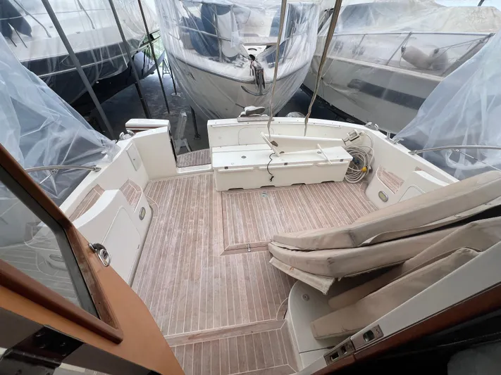 Yacht Photos Pics 2007 Cantieri Estensi Goldstar 440 yacht interior with spacious deck and seating.