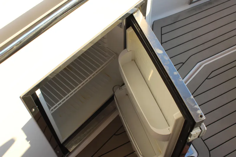 Gratitude Yacht Photos Pics Open mini fridge on 2015 Regal 35 Sport Coupe boat deck.