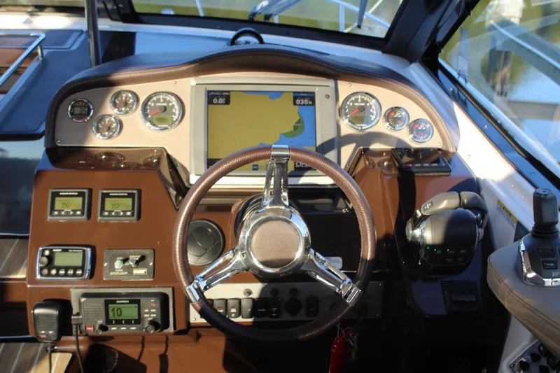 Gratitude Yacht Photos Pics 2015 Regal 35 Sport Coupe dashboard with navigation and control instruments.