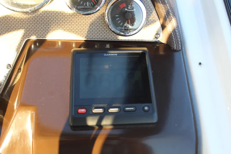 Gratitude Yacht Photos Pics Garmin display and gauges on 2015 Regal 35 Sport Coupe dashboard.