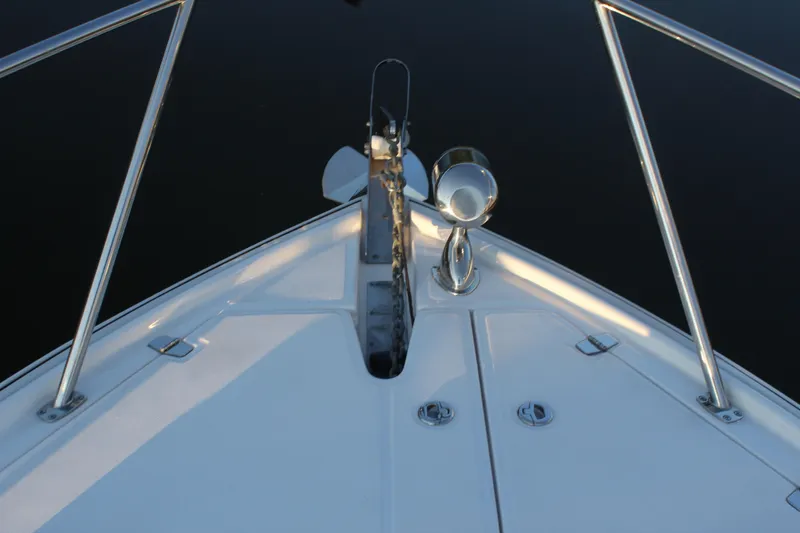 Gratitude Yacht Photos Pics Bow view of 2015 Regal 35 Sport Coupe boat with anchor and spotlight.
