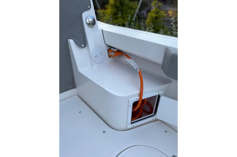  Yacht Photos Pics 2025 NorthCoast 285 HT boat interior with orange cable storage compartment.
