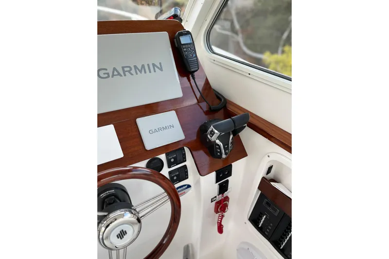 Yacht Photos Pics NorthCoast 285 HT 2025 helm with Garmin electronics and control panel.
