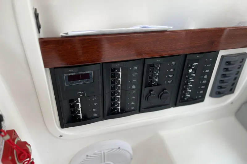  Yacht Photos Pics Control panel of 2025 NorthCoast 285 HT boat with switches and gauges.