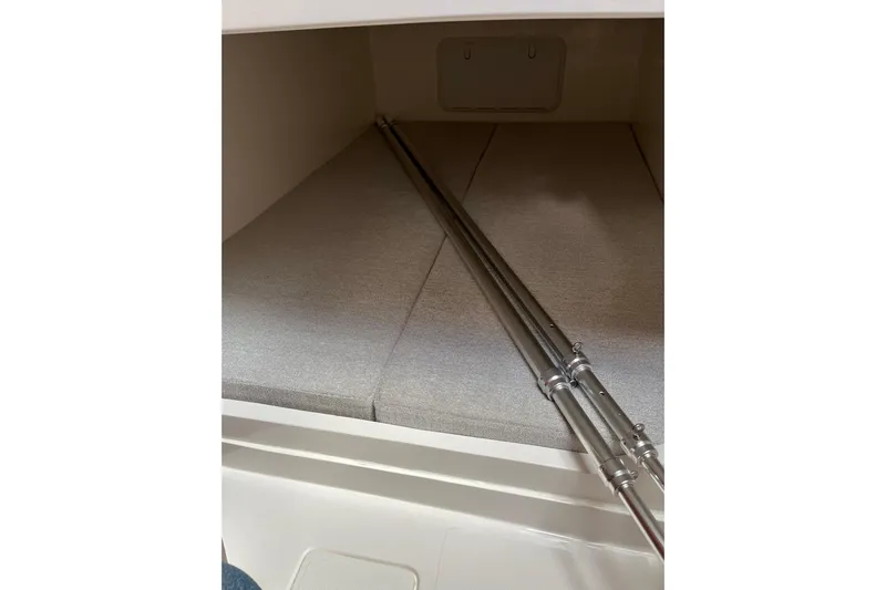  Yacht Photos Pics Interior cabin of 2025 NorthCoast 285 HT boat with cushioned seating.