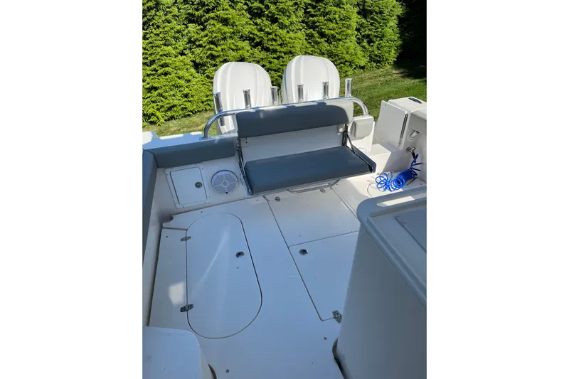  Yacht Photos Pics 2025 NorthCoast 285 HT boat interior with seating and storage compartments.