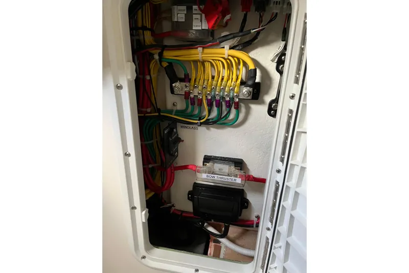  Yacht Photos Pics Electrical panel of 2025 NorthCoast 285 HT boat, featuring organized wiring and labeled components.