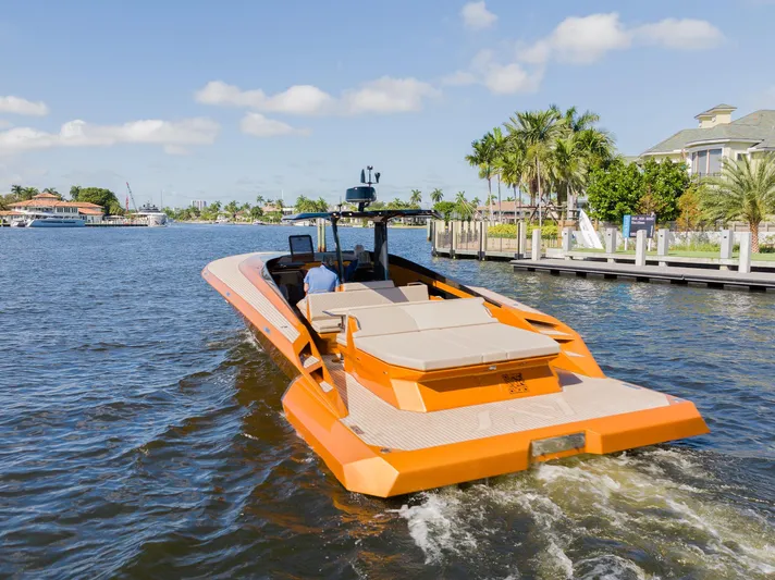  Yacht Photos Pics SAY Carbon Yachts 42 Open 2022 cruising on a sunny day near waterfront homes.