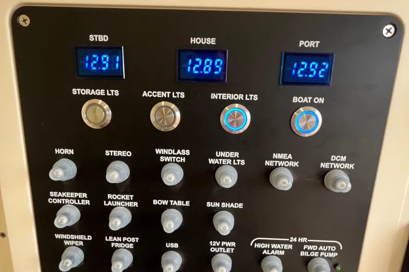  Yacht Photos Pics Control panel of 2024 Scout 330 LXF boat with digital displays and switches.