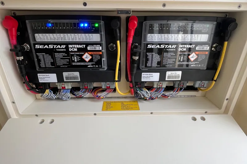  Yacht Photos Pics 2024 Scout 330 LXF electrical panel with SeaStar Interact DCM units.