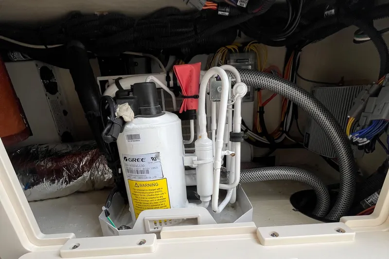  Yacht Photos Pics 2024 Scout 330 LXF boat engine compartment with wiring and components.