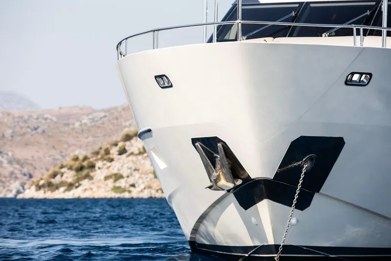  Yacht Photos Pics Sanlorenzo SL86 yacht anchored in scenic coastal waters, 2017 model.