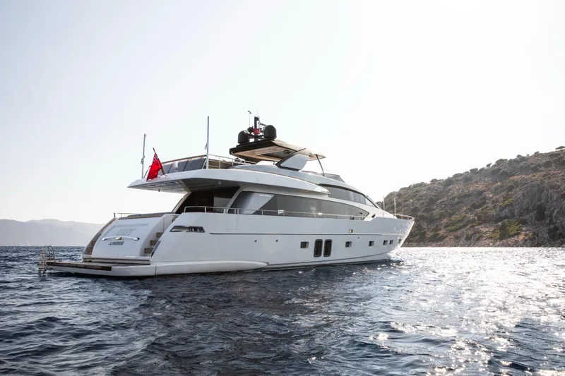  Yacht Photos Pics Luxurious 2017 Sanlorenzo SL86 yacht cruising near rocky coastline.