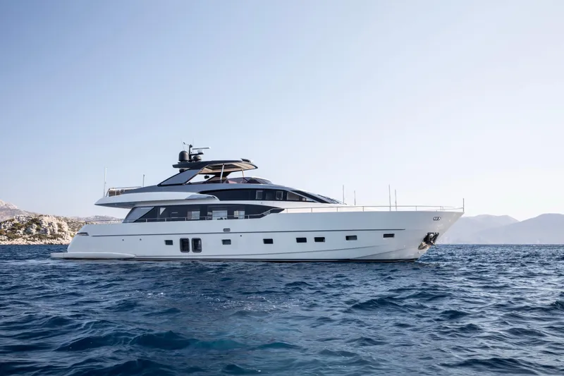  Yacht Photos Pics 2017 Sanlorenzo SL86 yacht cruising on open sea with scenic coastal backdrop.