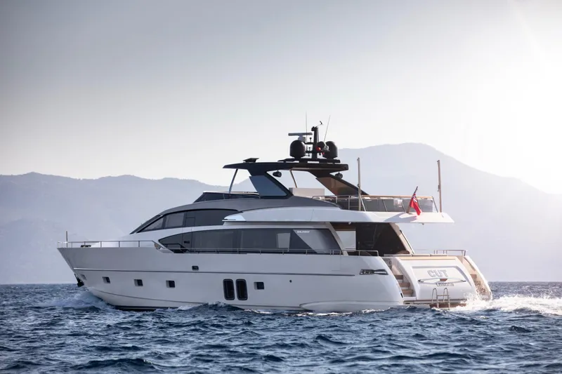  Yacht Photos Pics Luxury 2017 Sanlorenzo SL86 yacht cruising on open water with mountainous backdrop.