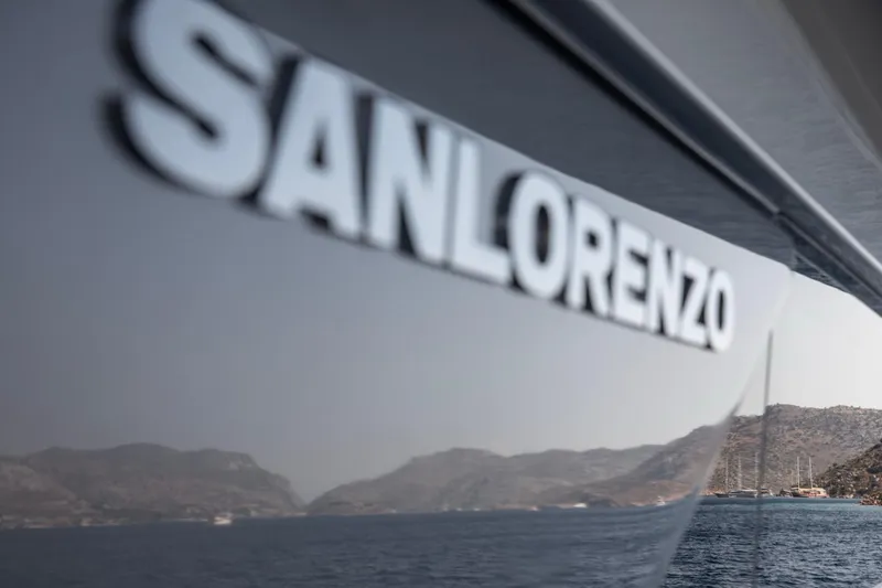  Yacht Photos Pics Sanlorenzo SL86 yacht reflecting scenic coastal landscape, 2017 model.