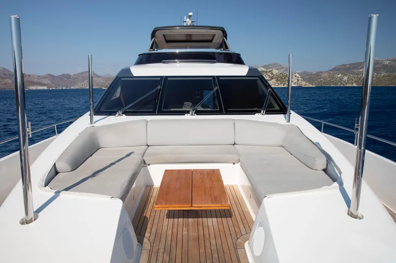  Yacht Photos Pics 2017 Sanlorenzo SL86 yacht deck with seating and table, ocean view.