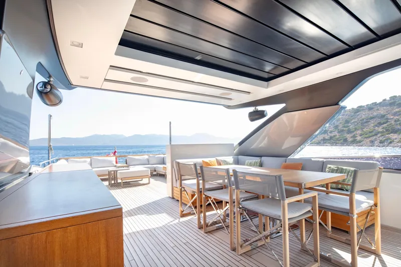 Yacht Photos Pics Luxurious 2017 Sanlorenzo SL86 yacht deck with seating, dining area, and ocean view.