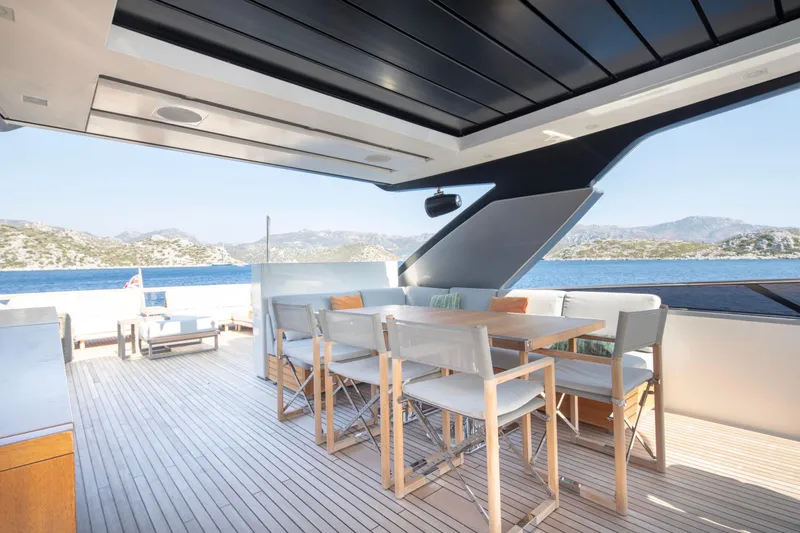  Yacht Photos Pics Luxurious 2017 Sanlorenzo SL86 yacht deck with elegant seating and scenic ocean view.