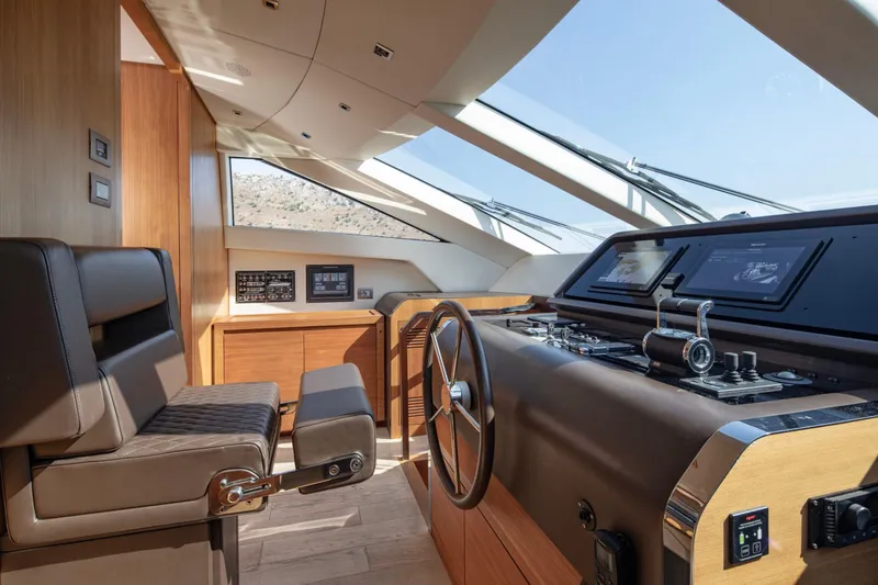  Yacht Photos Pics Luxurious 2017 Sanlorenzo SL86 yacht helm with modern controls and panoramic windows.