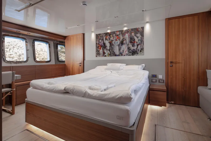  Yacht Photos Pics Luxurious bedroom interior of 2017 Sanlorenzo SL86 yacht with modern decor and large windows.