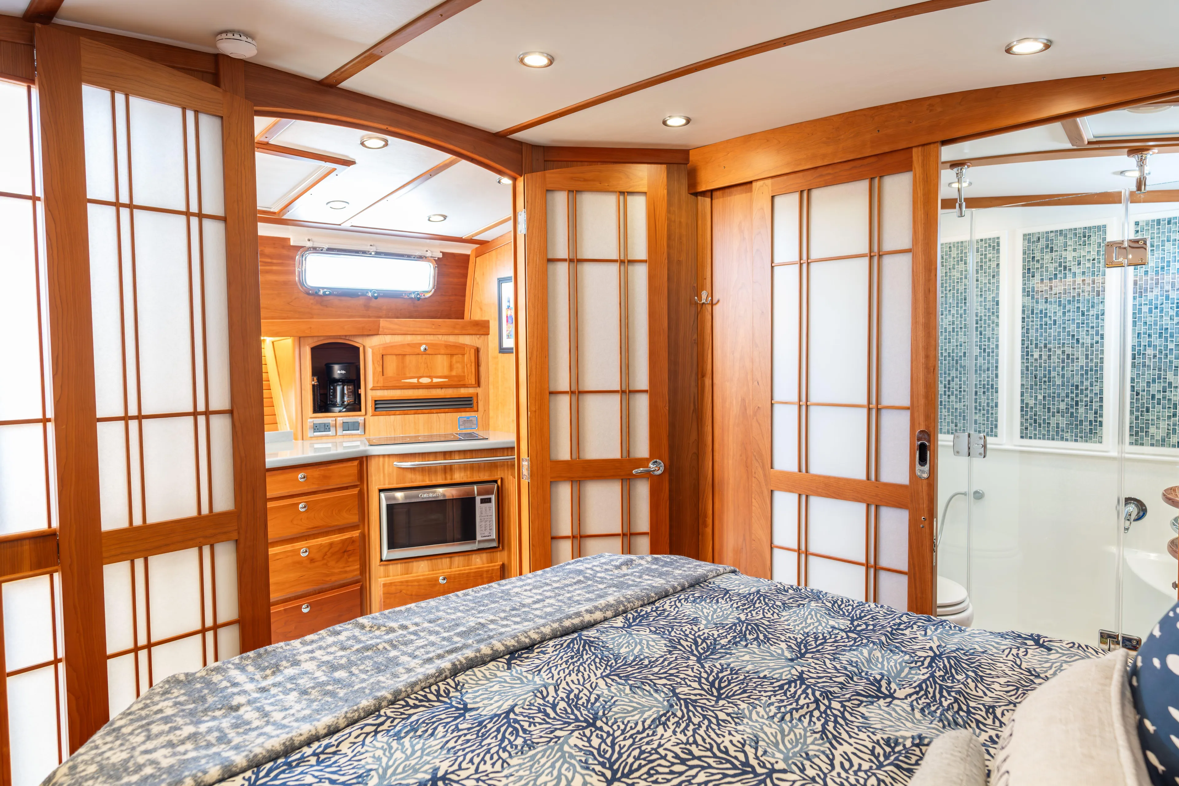 Gracious Yacht Photos Pics Luxurious interior of 2020 Sabre 48 Salon Express yacht with wood accents and modern amenities.