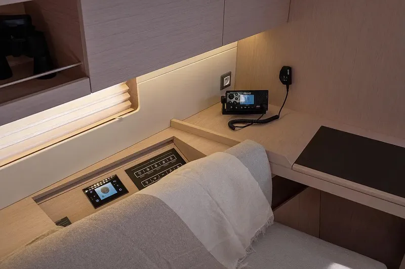  Yacht Photos Pics Interior of 2021 Beneteau Oceanis 46.1 yacht with navigation equipment and modern design.