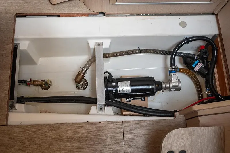  Yacht Photos Pics Beneteau Oceanis 46.1 2021 yacht interior showing plumbing and pump system.
