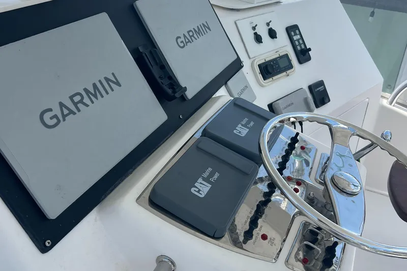  Yacht Photos Pics Control panel of a 2005 Cabo 40 Flybridge with Garmin navigation systems.