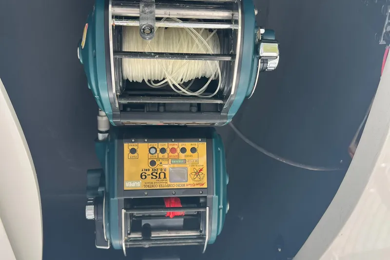  Yacht Photos Pics Fishing reel equipment on a 2005 Cabo 40 Flybridge boat.