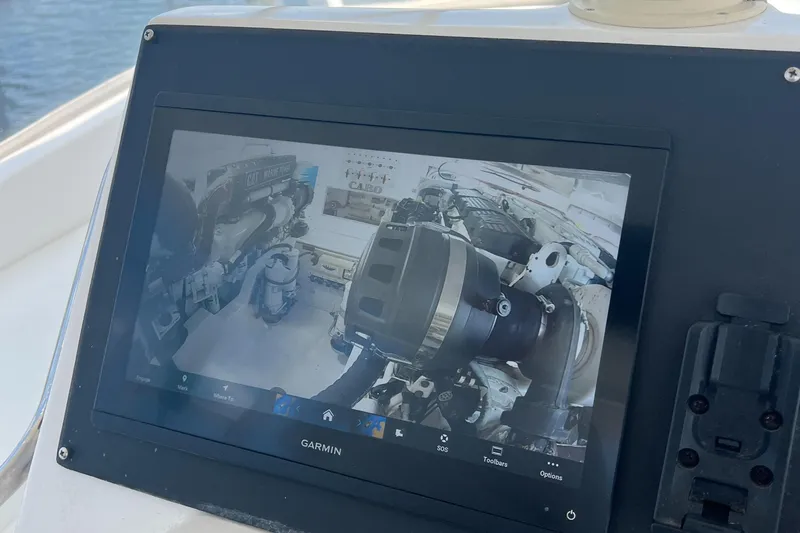  Yacht Photos Pics Display screen showing engine room of 2005 Cabo 40 Flybridge boat.