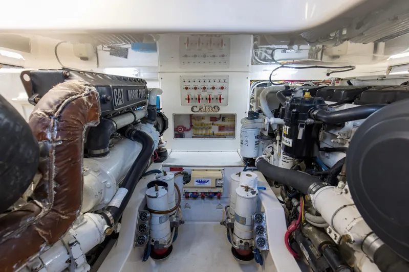  Yacht Photos Pics Engine room of a 2005 Cabo 40 Flybridge yacht, featuring CAT Marine Power engines.