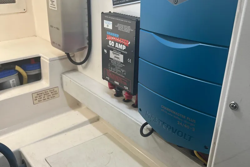  Yacht Photos Pics Electrical components inside a 2005 Cabo 40 Flybridge, featuring a Vanner 60 AMP battery equalizer.