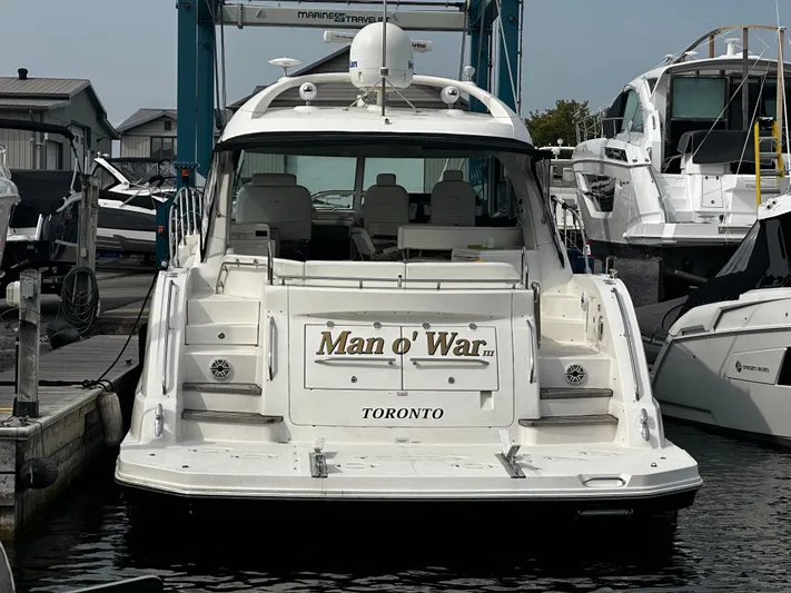 Man O War Yacht Photos Pics 2009 Sea Ray 580 Sundancer yacht named "Man o' War" docked in Toronto marina.