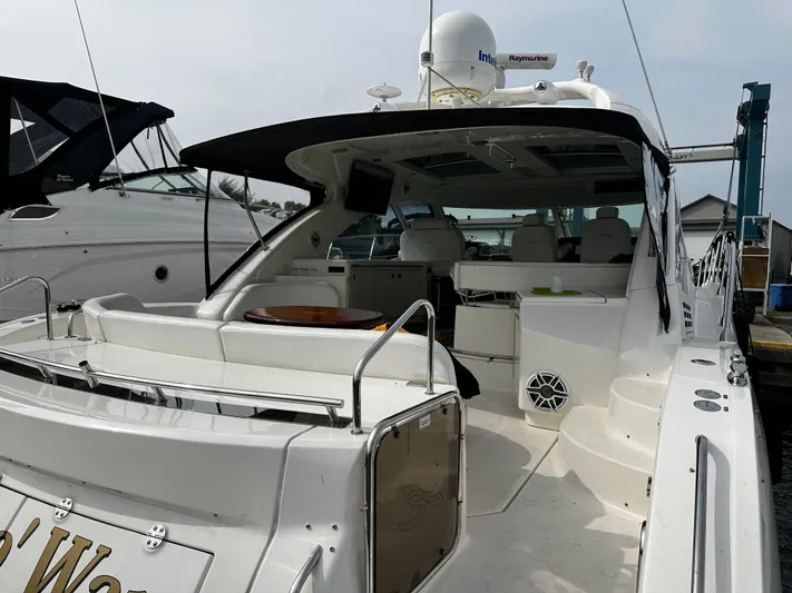 Man O War Yacht Photos Pics 2009 Sea Ray 580 Sundancer yacht with spacious deck and seating area.