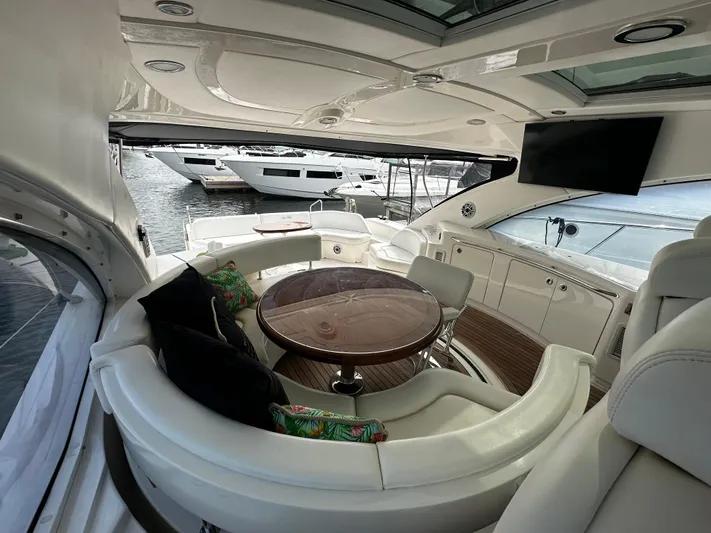 Man O War Yacht Photos Pics Luxurious 2009 Sea Ray 580 Sundancer yacht interior with plush seating and elegant design.