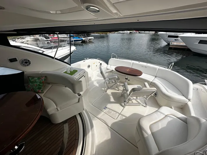 Man O War Yacht Photos Pics Luxurious 2009 Sea Ray 580 Sundancer yacht interior with elegant seating and waterfront view.