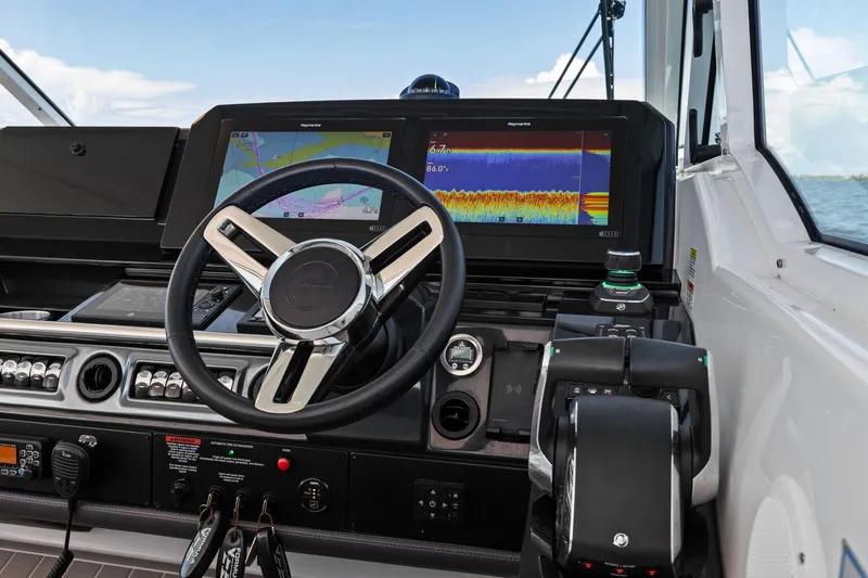  Yacht Photos Pics 2023 Formula 380 Super Sport Crossover OB dashboard with advanced navigation displays.