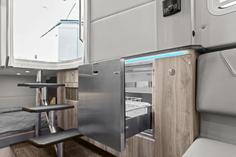  Yacht Photos Pics 2023 Formula 380 Super Sport Crossover OB interior with modern cabinetry and open drawer.