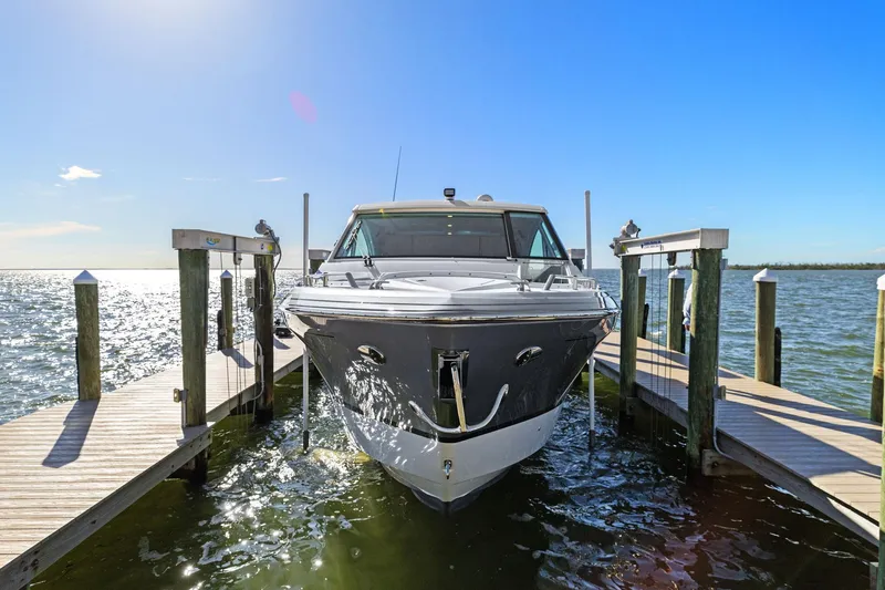  Yacht Photos Pics 2023 Formula 380 Super Sport Crossover OB docked on sunny waterfront.
