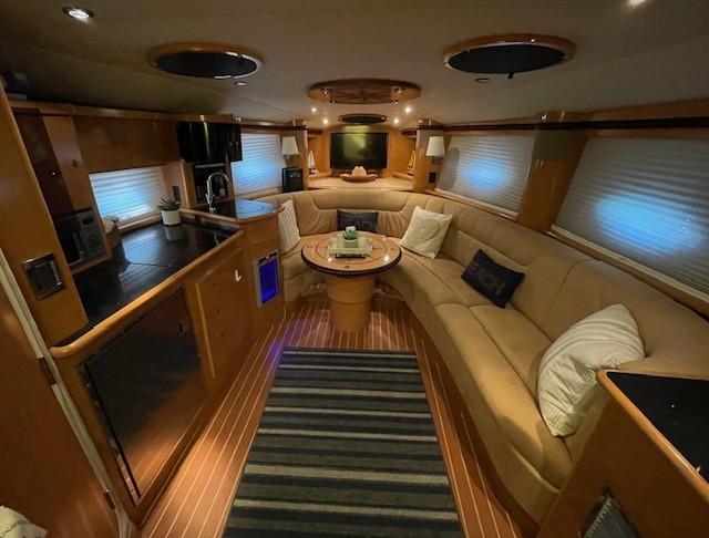 2008 Larson Cabrio 330 Day Cruiser interior with cozy seating and modern amenities.