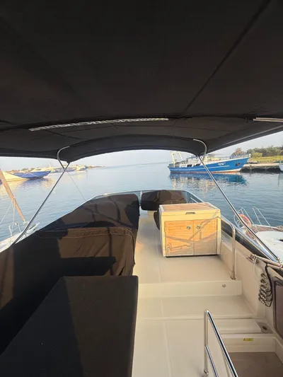  Yacht Photos Pics 2018 Beneteau Monte Carlo 5 yacht deck with covered seating and ocean view.