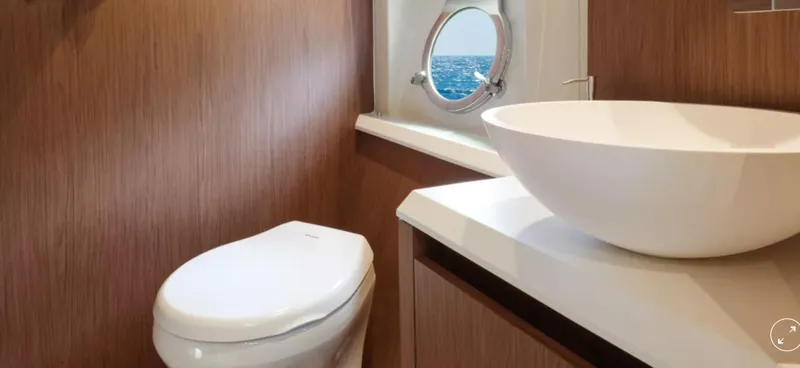 Yacht Photos Pics Luxurious bathroom in 2018 Beneteau Monte Carlo 5 yacht with ocean view.