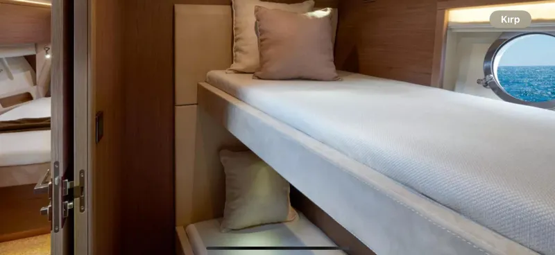  Yacht Photos Pics Interior of 2018 Beneteau Monte Carlo 5 yacht with cozy bunk beds and ocean view.