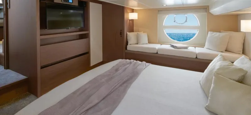  Yacht Photos Pics Luxurious cabin interior of 2018 Beneteau Monte Carlo 5 yacht with ocean view.