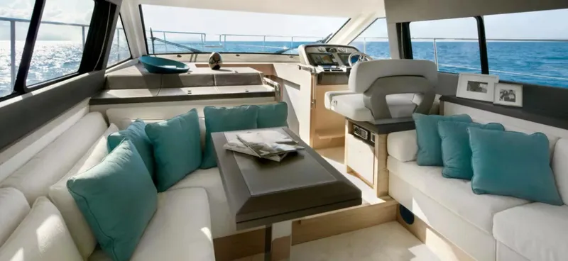  Yacht Photos Pics Luxurious interior of 2018 Beneteau Monte Carlo 5 yacht with ocean view.