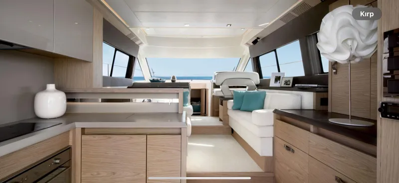  Yacht Photos Pics Luxurious interior of 2018 Beneteau Monte Carlo 5 yacht with modern design and elegant furnishings.