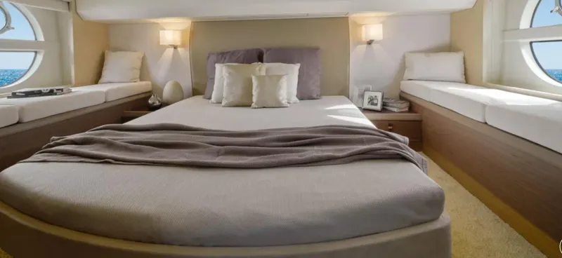  Yacht Photos Pics Luxurious bedroom interior of 2018 Beneteau Monte Carlo 5 yacht with ocean view windows.