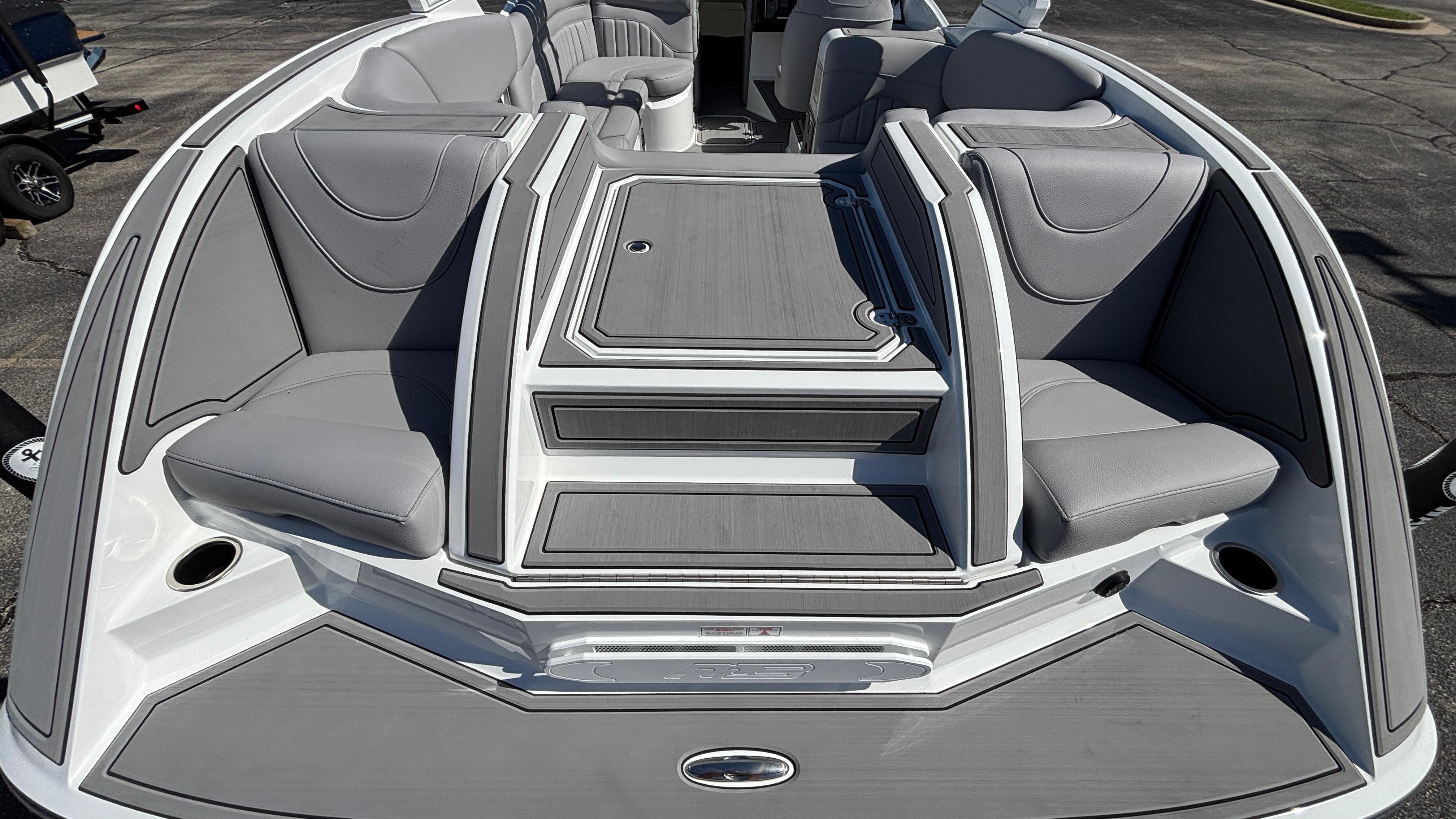 2025 MB B52 25 Alpha boat interior with gray seating and sleek design.