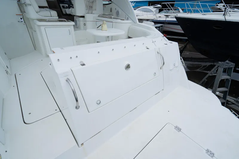  Yacht Photos Pics 2008 Cruisers 420 Express yacht deck with seating and storage compartments.